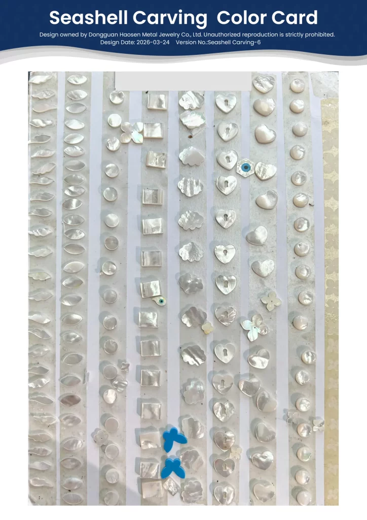 A variety of custom seashell carving and mother-of-pearl shapes for jewelry making, featuring hearts, flowers, clouds, and geometric inlays in natural white shell finish by Dongguan Haosen Metal Jewelry.
